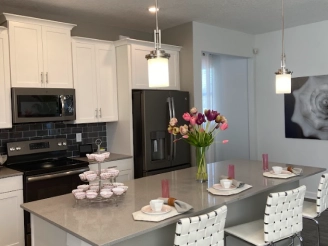 Beautiful clean kitchen with central balcony